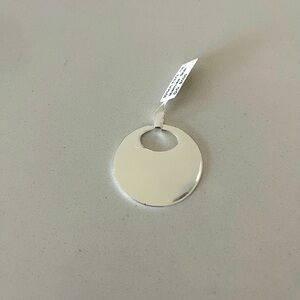 Sterling silver 925 disc pendant New with tag.
